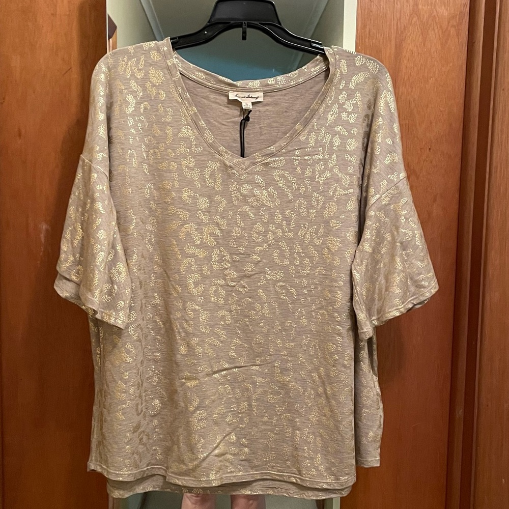 Jane and Delancey Tan and Gold Top